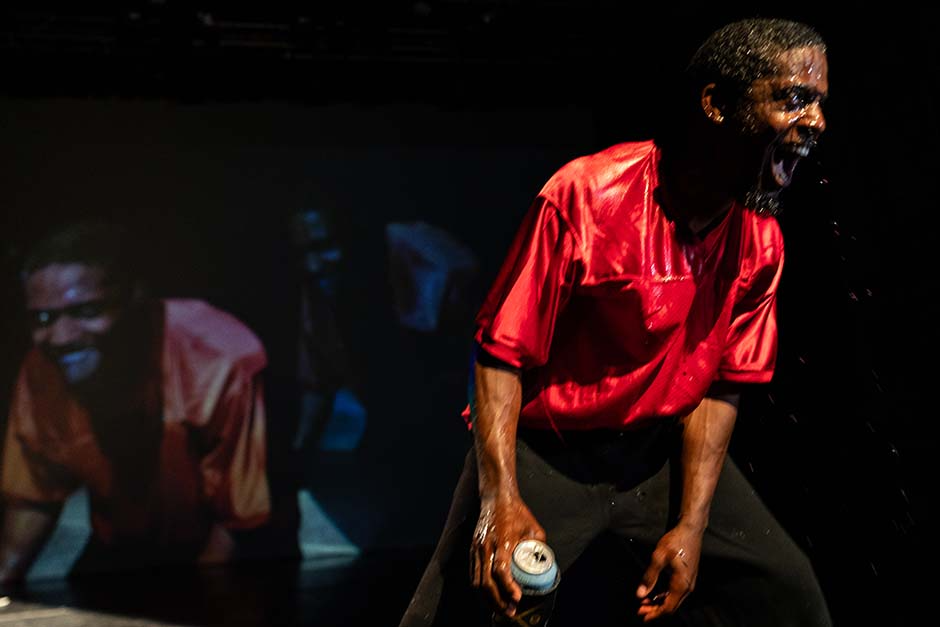 MCLA Baye and Asa performer showing emotion.