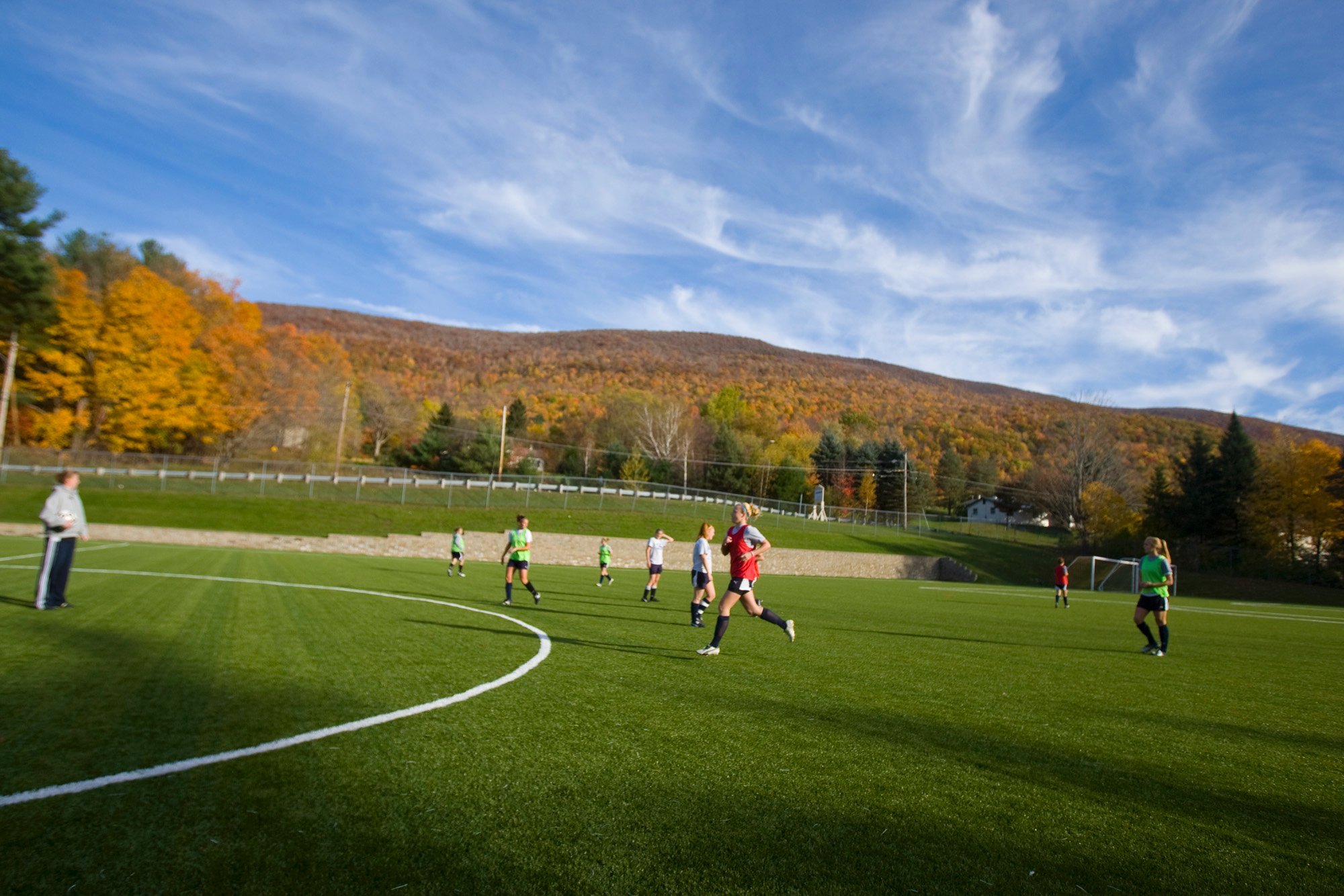 Soccer players in the athletic field