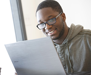 Young man working on his computer