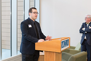 Student speaking at podium