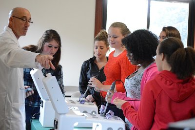 Professor explaining lab equipment