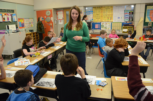 Teacher leading class discussion