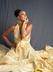 Maya Azucena in a long dress