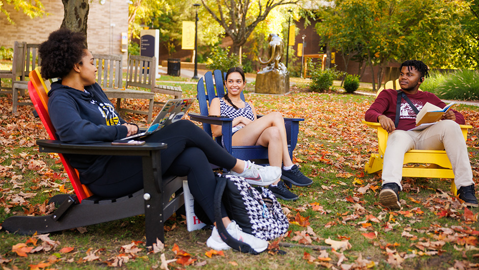 MCLA campus students talking outdoors