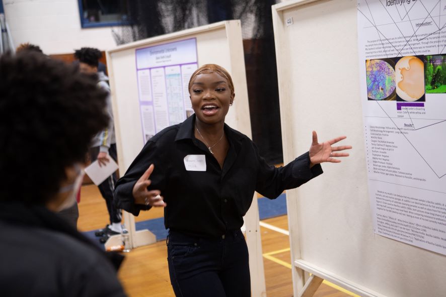 MCLA Education graduate student presenting at a conference