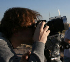 Student photographing an eclipse