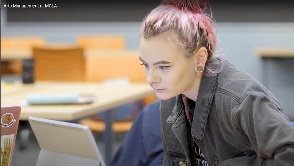 Student working on her computer