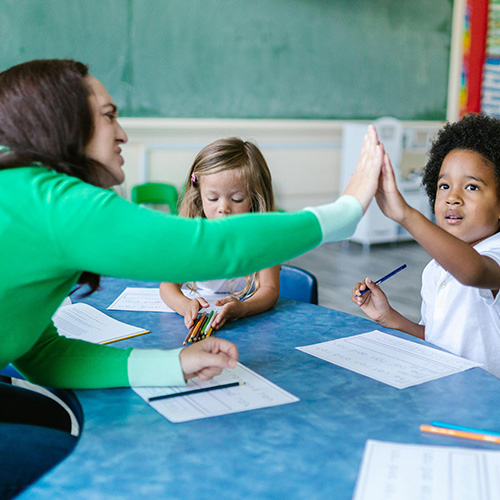 Teacher with children