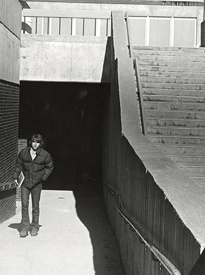 Guy walking up a ramp