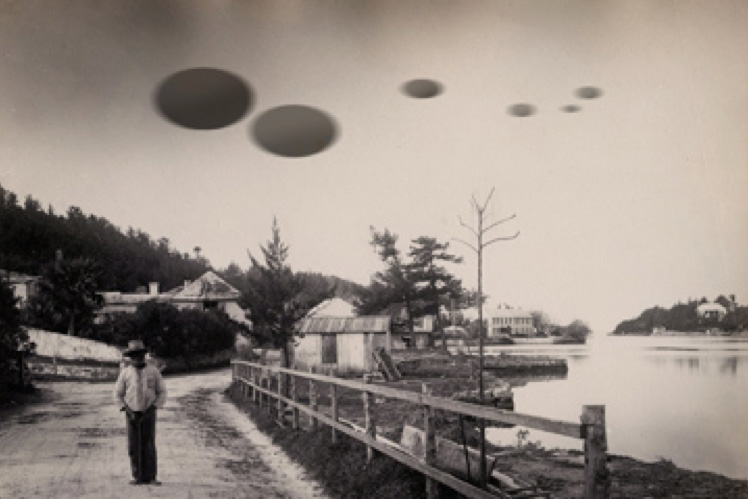 round shapes in the sky and man walking