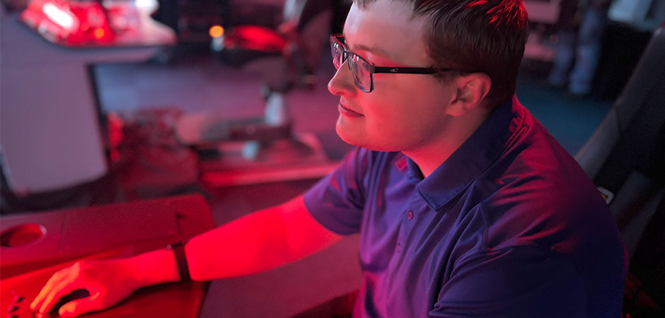 MCLA's Computer Science major William Garrity at a computer MCLA's Computer Science major William Garrity at a computer