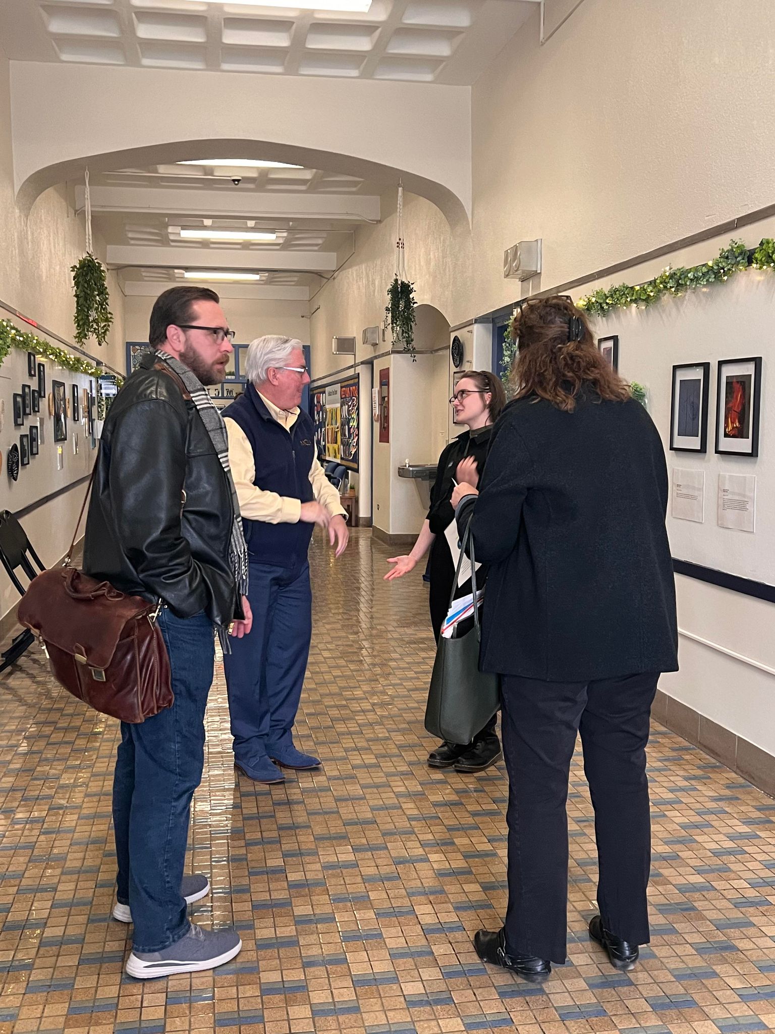 group of people in the mark hopkins hall gallery