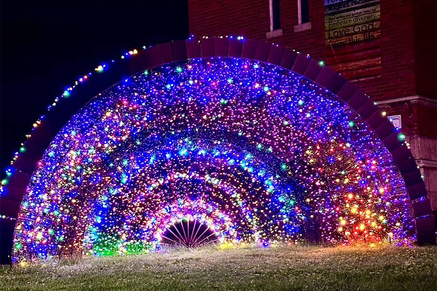 An artistic display lit at night.