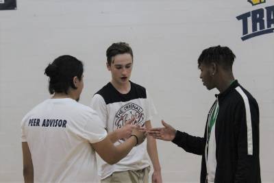 Student shaking hands