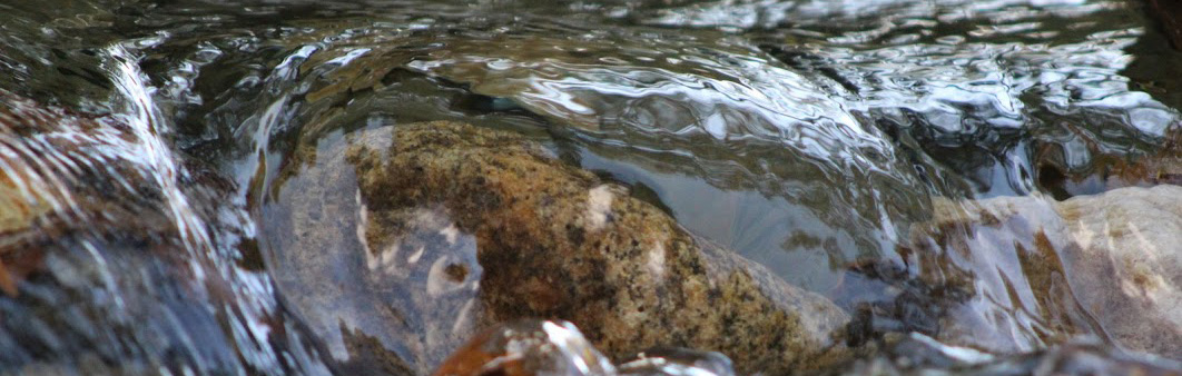 water flowing over rocks