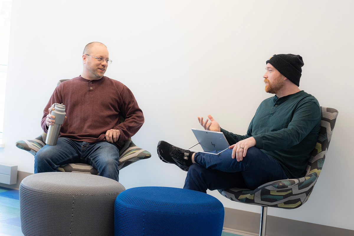 A student mentoring another outside the classroom.